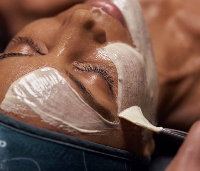 Client receiving Pro Calm 30 skin treatment at Hair & Beauty by Deepawali salon